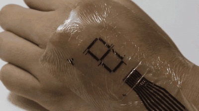 這種超薄電子皮膚能化身“電子顯示屏”.gif